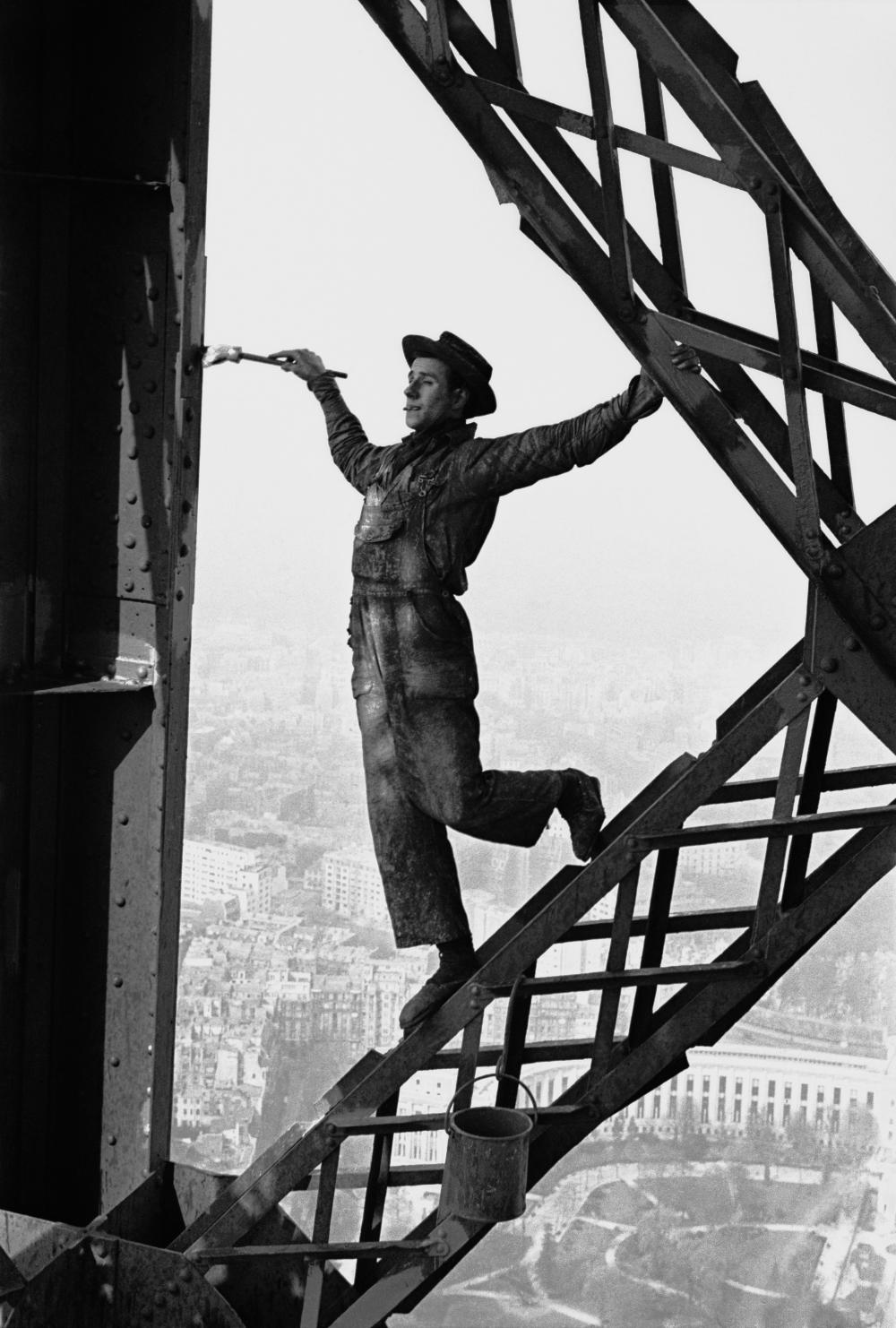 The iconic picture above "Zazou the Eiffel tower's painter" was taken by French photographer Marc Riboud in Paris in 1953
