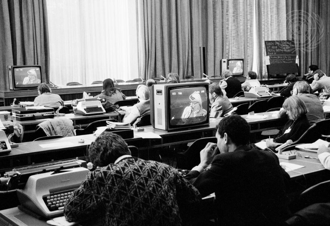 Press correspondents listening to Yasser Arafat, Chairman of the Executive Committee of the Palestine Liberation Organization (PLO), at the 43rd session of the UN General Assembly which took place at the United Nations at Geneva on 13 December 1988