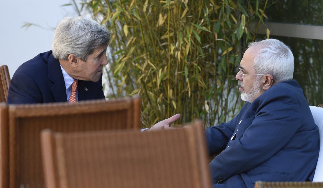 US Secretary of State John Kerry (L) talks with Iranian Foreign Minister Mohammad Javad Zarif on May 30, 2015