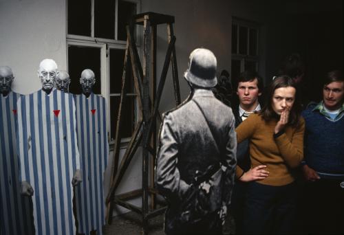 This photo was taken at the Auschwitz-Birkenau Museum in 1981 by photojournalist Bruno Barbey. 