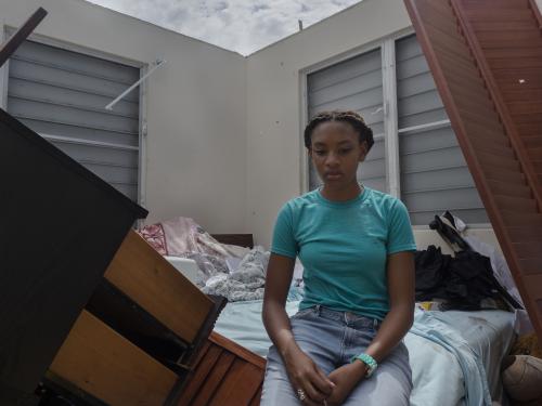 Magnum photographer Enri Canaj covered the aftermath of hurricanes Irma and Maria. Here Sera, age 13, in the remains of her house in St Croix, US Virgin Islands.